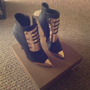 Black Booties with metallic gold shield
